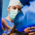 51679990 - surgeons working in the emergency room in team.